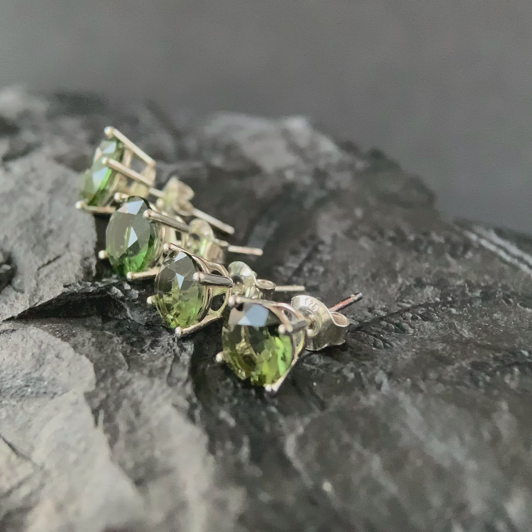 video shows 7 and 8 mm Moldavite silver stud earrings